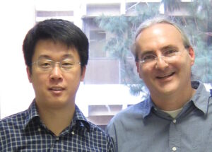 Lin Quan (left) and John Heidemann, after Lin's PhD defense.
